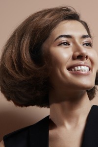 happy shiny asian woman with a short hair